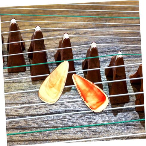 8 قطع من Toyvian Guzheng للأظافر المزيفة، واقيات أطراف الأصابع للبالغين والمبتدئين، مجموعة إصبع الإبهام المريحة، أداة خفيفة الوزن لممارسة الأدوات، أكمام أصابع بلون كهرماني من أجل Guzheng in Kuwait