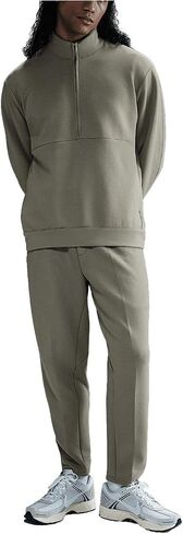 Nike 24.7 ImpossiblySoft Men's Dri-FIT Pants (HQ6970-320, Light Army/Steel Green) in Saudi Arabia
