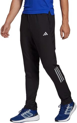 أديداس - بنطال Own The Run Astro Knit للرجال in Saudi Arabia