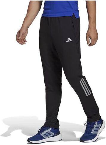 أديداس - بنطال Own The Run Astro Knit للرجال in Saudi Arabia