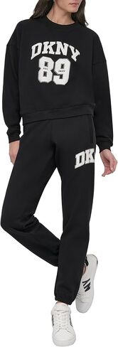 سويت شيرت نسائي من DKNY بشعار الجيرسيه بحجر الراين وياقة دائرية in Kuwait