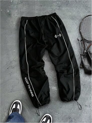 OYOANGLE Men's Graphic Workout Pants Drawstring Waist Fitness Trousers Loose Fit Gym Running Breathable Sweatpants in Saudi Arabia