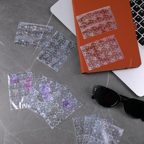 200 Pcs Laser Flashing Holographic Photo Card Sleeves Love Heart-Shape Transparent Waterproof Trading Card Protective Cover for Photo Card in Saudi Arabia