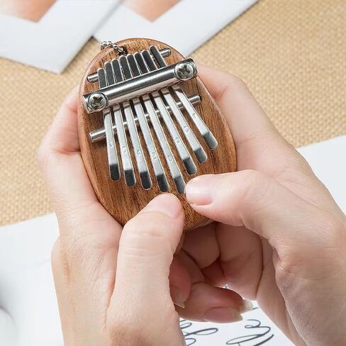 8 Key Mini Wood Kalimba Finger Thumb Piano Marimba Musical Good Accessories Pendant Gift in Saudi Arabia