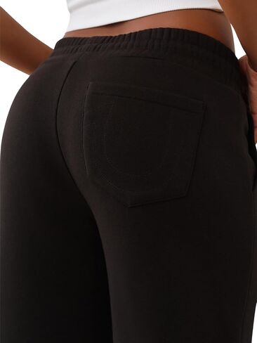 بنطال رياضي ذو أرجل واسعة كريستالي للنساء من True Religion - مزيج من القطن الناعم، حاشية واسعة، شعار كريستالي in Saudi Arabia