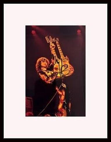 Framed Jimmy Page Autograph with Certificate of Authenticity in Saudi Arabia