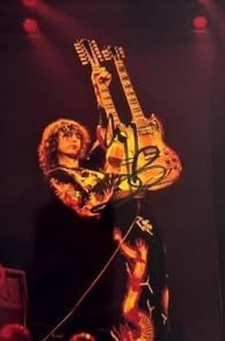 Framed Jimmy Page Autograph with Certificate of Authenticity in Saudi Arabia