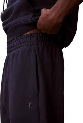 Calvin Klein Mens Monogram Logo Fleece Joggers in Saudi Arabia