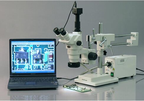 AmScope ZM-4T3 Professional Trinocular Stereo Zoom Microscope, EW10x Eyepieces, 2X-45X Magnification, 0.67X-4.5X Zoom Objective, Ambient Lighting, Double-Arm Boom Stand, Includes 0.3X Barlow Lens in Saudi Arabia