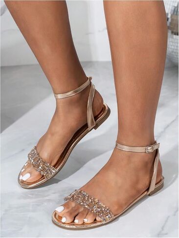 GORGLITTER Women's Metallic Sparkly Flat Sandals Dressy Summer Ankle Strap Open Toe Bridal Wedding Dress Shoes in Saudi Arabia
