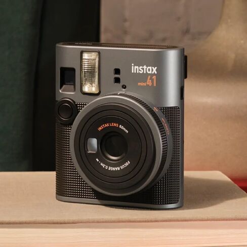 حزمة كاميرا FujiFilm Instax Mini 41 الفورية مع حزمة قيمة لفيلم Fuji Instax-Instant-mini (40 ورقة) + ألبوم صور - 64 جيبًا + حقيبة حمل متوافقة مع الطراز العتيق أسود + المزيد in Kuwait