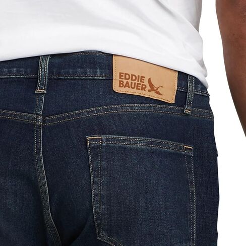 بنطلون جينز Eddie Bauer الرجالي ذو المقاس العادي القابل للتمدد في اتجاهين (أزرق داكن، 32 عرض × 30 طول) in Kuwait