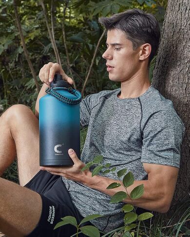 Coolplus Half Gallon Water Bottle Insulated with Paracord Handle & 3 Lid, 64 oz Water Bottle Food-grade Vacuum Large Water Jug Flask, Keep 24H Hot 48H Cold, Leak Proof & BPA-Free in Saudi Arabia